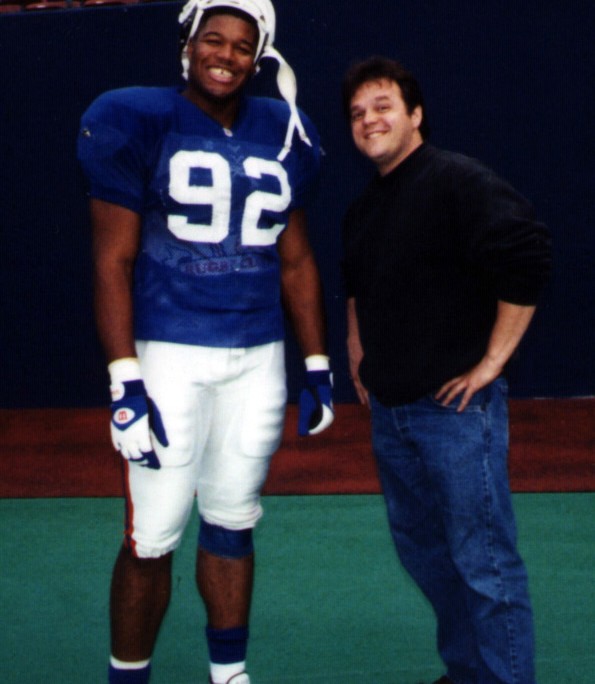 Edgar Brown and Michael Strahan at Giants Stadium Doing Photo Shoot